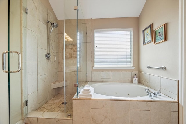 full bath featuring a tub with jets and a stall shower