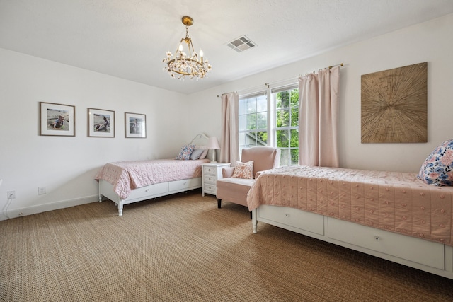 carpeted bedroom with visible vents, baseboards, and an inviting chandelier