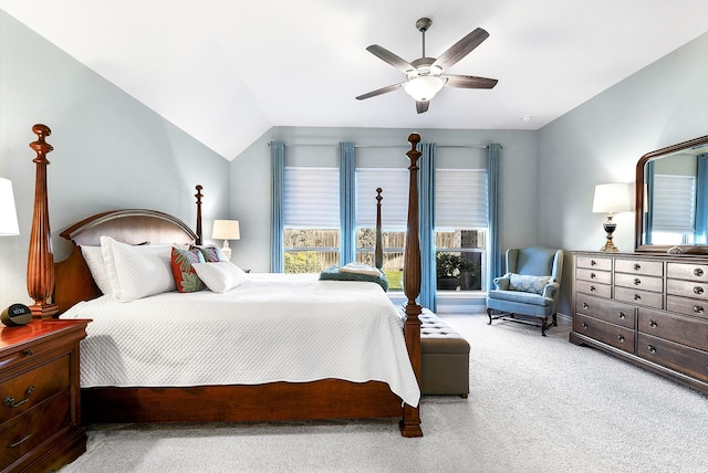 bedroom featuring a ceiling fan, lofted ceiling, and carpet floors