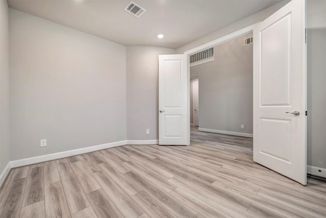 21443 Petherton Dr, Tomball, TX 77375 - empty room with visible vents, recessed lighting, baseboards, and light wood-type flooring