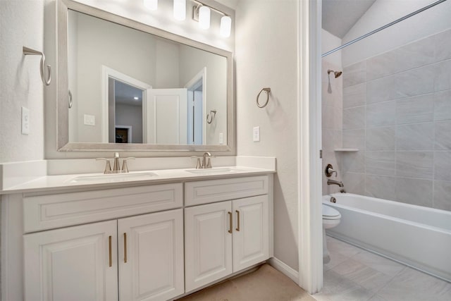 21443 Petherton Dr, Tomball, TX 77375 - bathroom featuring double vanity, a sink, bathtub / shower combination, and toilet