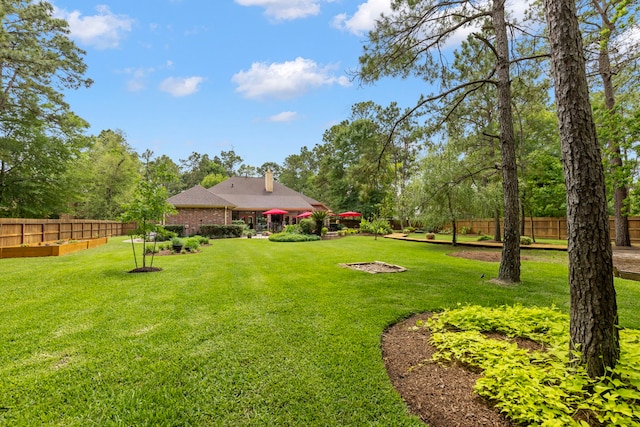 view of yard with fence