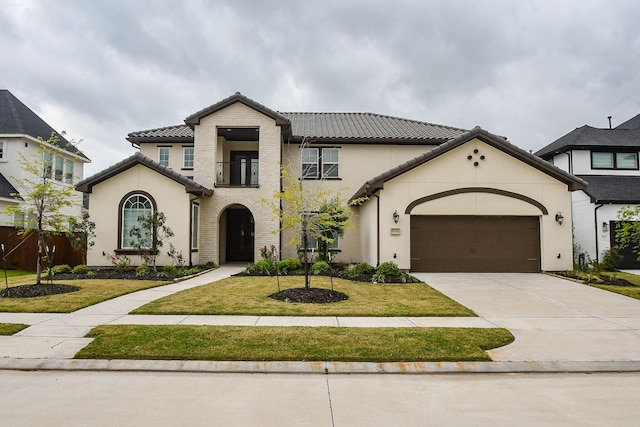 6939 Shoreline View Dr, Katy, TX 77493 - mediterranean / spanish house with a front yard, stucco siding, driveway, and a tile roof