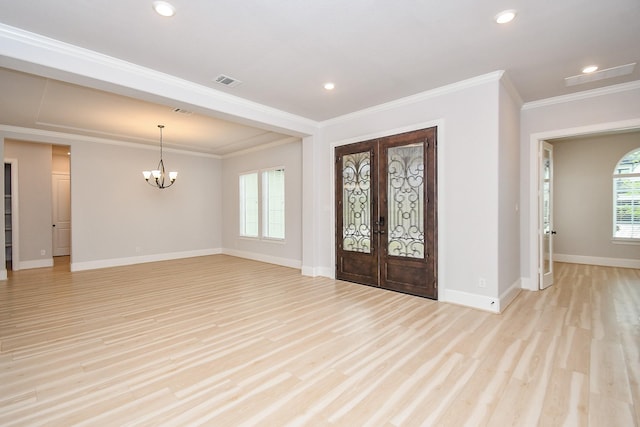 6939 Shoreline View Dr, Katy, TX 77493 - foyer entrance featuring a chandelier, visible vents, ornamental molding, and french doors