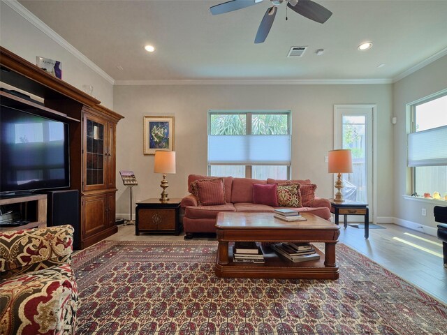 living room with ceiling fan, recessed lighting, wood finished floors, and visible vents