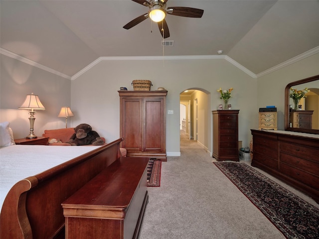 carpeted bedroom with arched walkways, baseboards, ornamental molding, and lofted ceiling