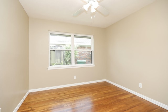 5714 Nina Lee Ln, Houston, TX 77092 - spare room featuring light wood finished floors, baseboards, and a ceiling fan