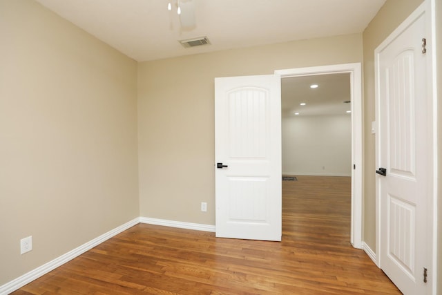 5714 Nina Lee Ln, Houston, TX 77092 - unfurnished room with wood finished floors, baseboards, ceiling fan, and recessed lighting