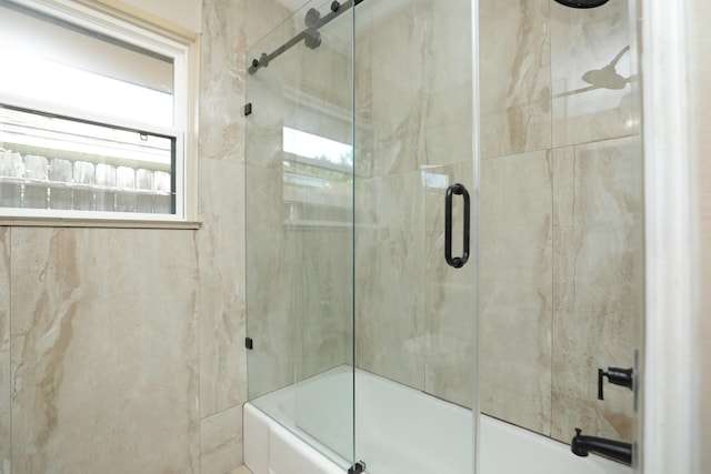 5714 Nina Lee Ln, Houston, TX 77092 - full bathroom featuring bath / shower combo with glass door and healthy amount of natural light