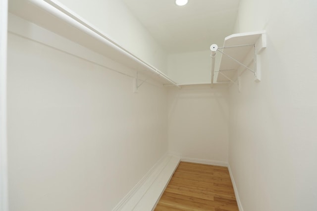 5714 Nina Lee Ln, Houston, TX 77092 - walk in closet featuring light wood finished floors
