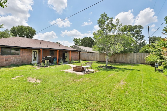 5714 Nina Lee Ln, Houston, TX 77092 - view of yard with a fire pit and a patio area