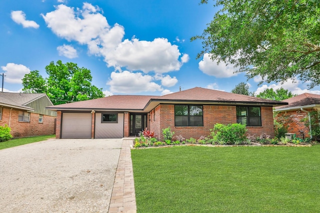 5714 Nina Lee Ln, Houston, TX 77092 - ranch-style home with an attached garage, concrete driveway, brick siding, a front yard, and a shingled roof