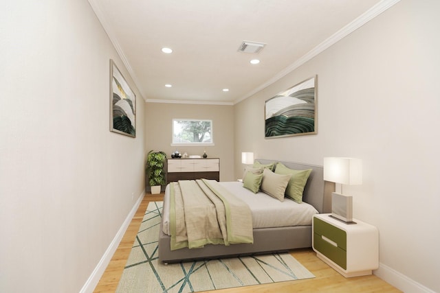 5714 Nina Lee Ln, Houston, TX 77092 - bedroom with light wood-style flooring, recessed lighting, ornamental molding, and baseboards