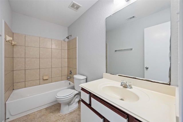 bathroom featuring visible vents, toilet, tub / shower combination, and vanity