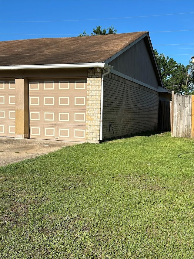 garage featuring fence