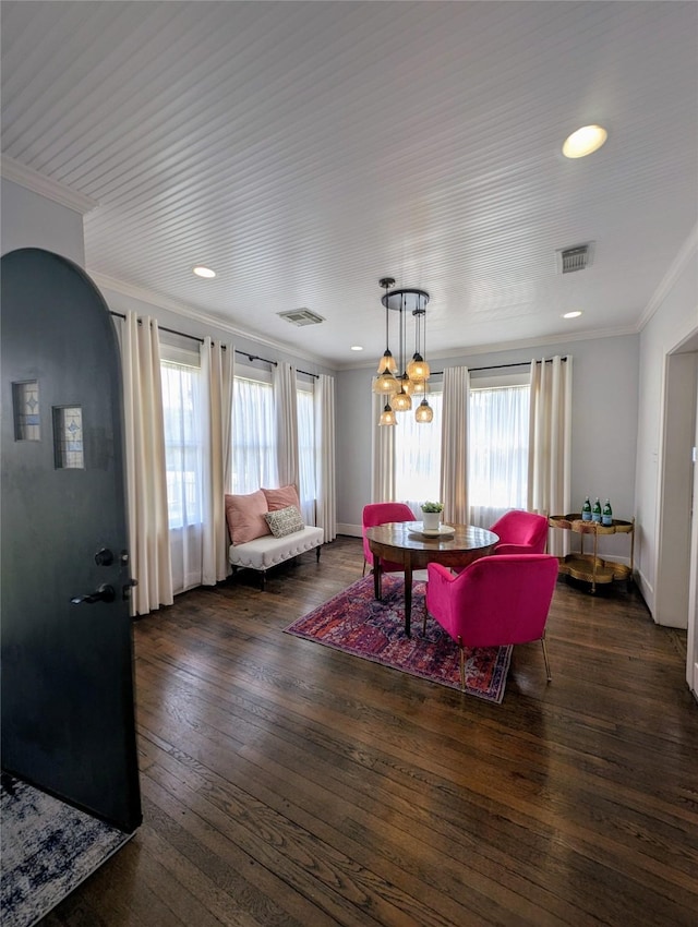 dining area with visible vents, ornamental molding, and plenty of natural light