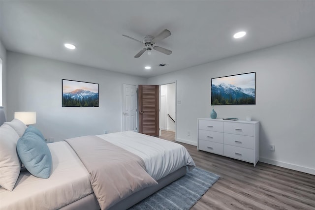 bedroom featuring visible vents, baseboards, recessed lighting, a ceiling fan, and light wood finished floors