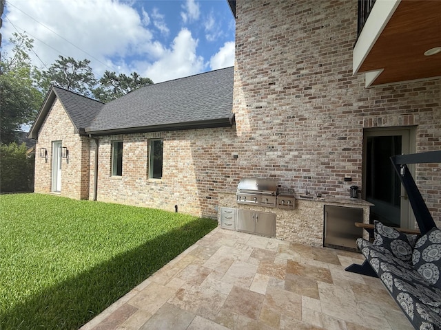 13927 Perthshire Rd, Houston, TX 77079 - view of patio with grilling area and exterior kitchen