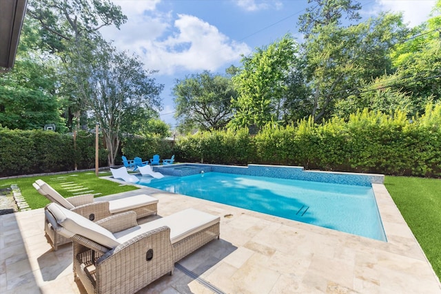 13927 Perthshire Rd, Houston, TX 77079 - view of pool with a lawn, a patio, a pool with connected hot tub, outdoor lounge area, and view of wooded area