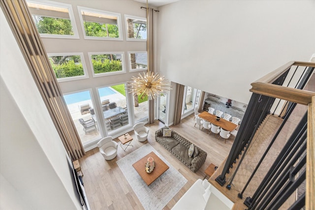 13927 Perthshire Rd, Houston, TX 77079 - living room with a towering ceiling, plenty of natural light, and wood finished floors