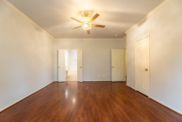 unfurnished room featuring baseboards, a ceiling fan, wood finished floors, and ornamental molding