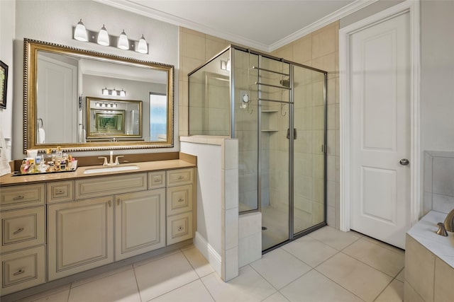 bathroom featuring vanity, crown molding, tile patterned flooring, and a stall shower