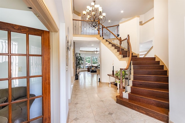 6310 Indiangrass Ct, Katy, TX 77494 - foyer entrance with recessed lighting, stairway, an inviting chandelier, light tile patterned floors, and baseboards