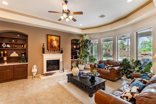 6310 Indiangrass Ct, Katy, TX 77494 - living area featuring recessed lighting, ornamental molding, ceiling fan, and built in features