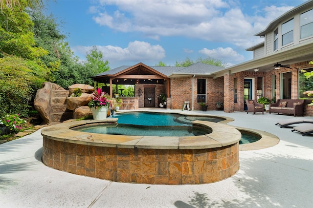 6310 Indiangrass Ct, Katy, TX 77494 - pool with an outdoor hangout area, a patio, an in ground hot tub, and ceiling fan