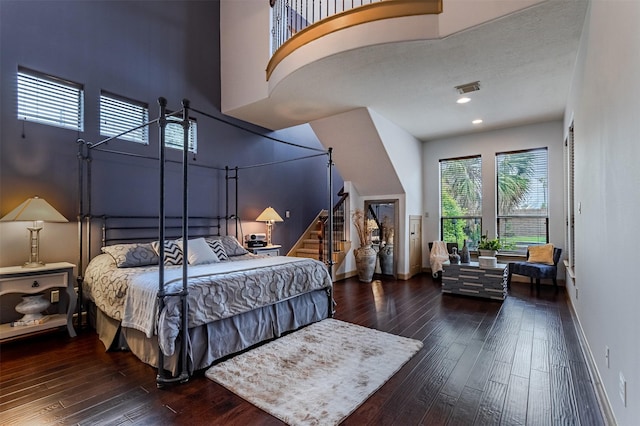 6310 Indiangrass Ct, Katy, TX 77494 - bedroom featuring baseboards, hardwood / wood-style floors, and visible vents