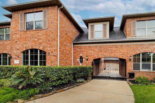 6310 Indiangrass Ct, Katy, TX 77494 - exterior space with a gate and brick siding