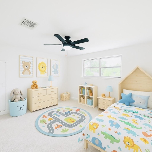 carpeted bedroom featuring visible vents and ceiling fan