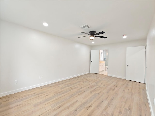 unfurnished room featuring recessed lighting, ceiling fan, light wood finished floors, baseboards, and visible vents