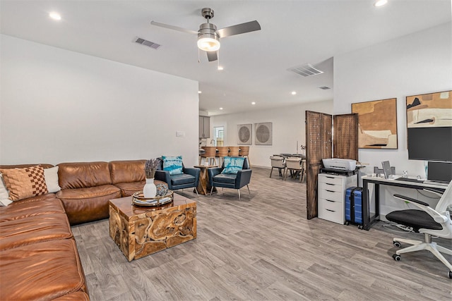12823 Tokenhouse Ln, Houston, TX 77047 - home office featuring light wood finished floors, ceiling fan, and recessed lighting