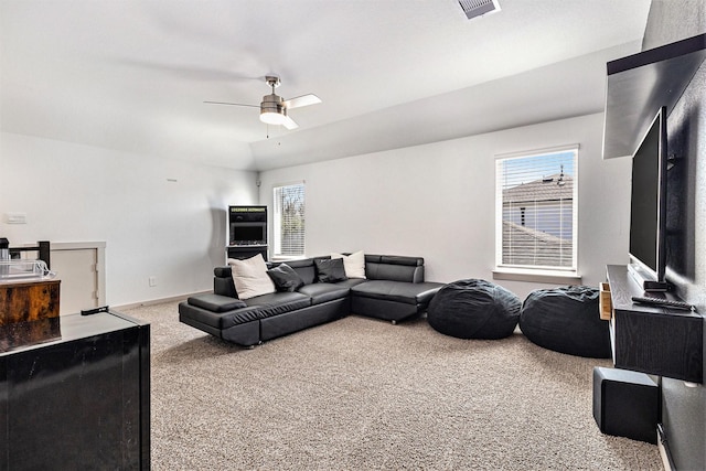 12823 Tokenhouse Ln, Houston, TX 77047 - carpeted living area featuring ceiling fan, healthy amount of natural light, and baseboards