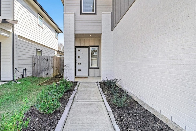 12823 Tokenhouse Ln, Houston, TX 77047 - doorway to property featuring board and batten siding and fence