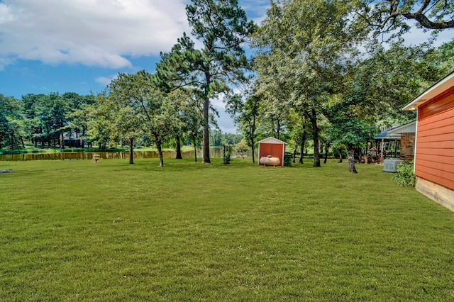 29133 E Lake Dr, Hempstead, TX 77445 - view of yard featuring an outbuilding and a storage unit