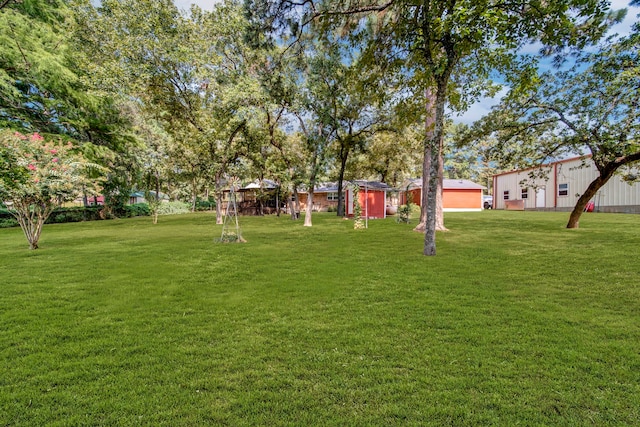 29133 E Lake Dr, Hempstead, TX 77445 - view of yard featuring a garage