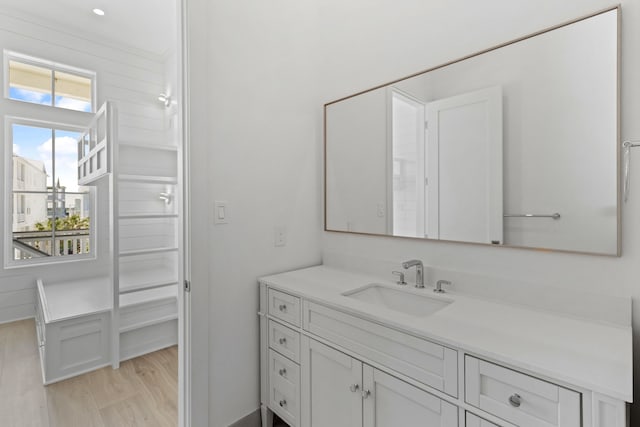 11365 Beachside Dr, Galveston, TX 77554 - bathroom with vanity and wood finished floors
