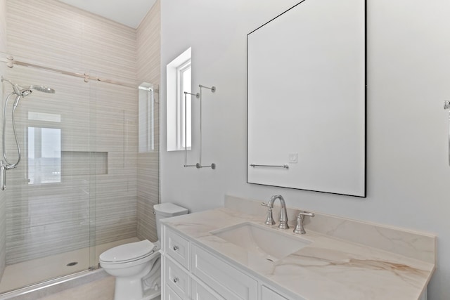 11365 Beachside Dr, Galveston, TX 77554 - bathroom featuring a shower stall, toilet, and vanity
