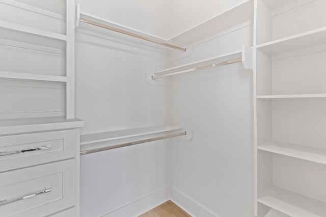 11365 Beachside Dr, Galveston, TX 77554 - spacious closet with light wood-type flooring