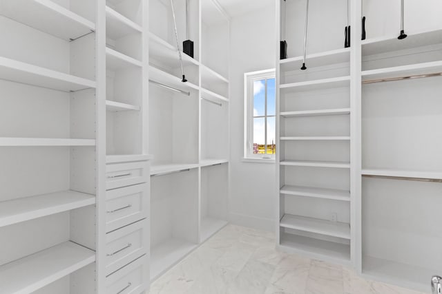 11365 Beachside Dr, Galveston, TX 77554 - spacious closet with light marble finish flooring