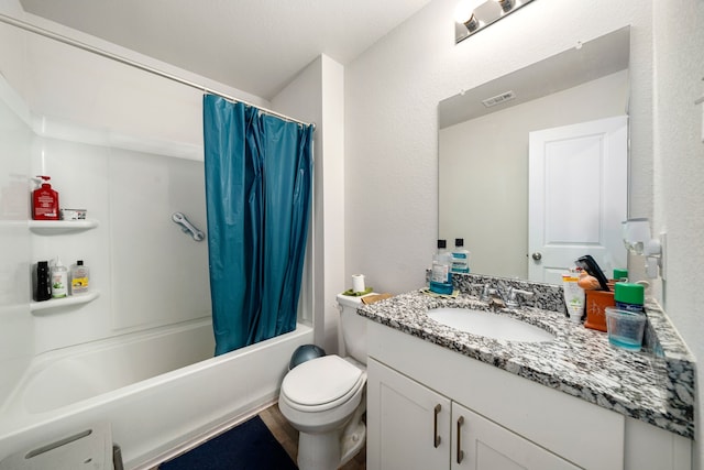 bathroom with vanity, shower / bathtub combination with curtain, toilet, and visible vents