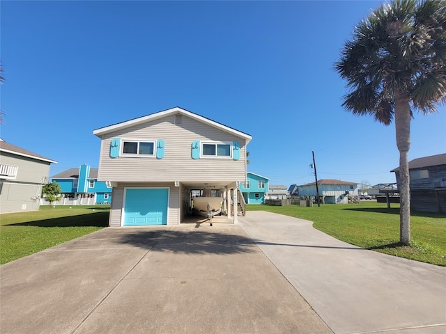 16607 Henry Morgan Rd, Jamaica Beach, TX 77554 - view of front facade with a garage, driveway, a front lawn, and a carport