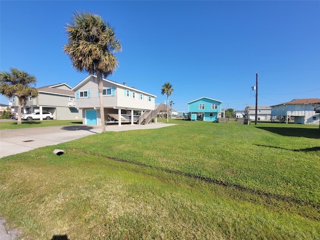 16607 Henry Morgan Rd, Jamaica Beach, TX 77554 - exterior space featuring stairway and driveway