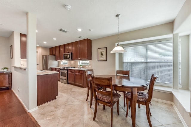 dining room with visible vents, recessed lighting, baseboards, and light tile patterned floors