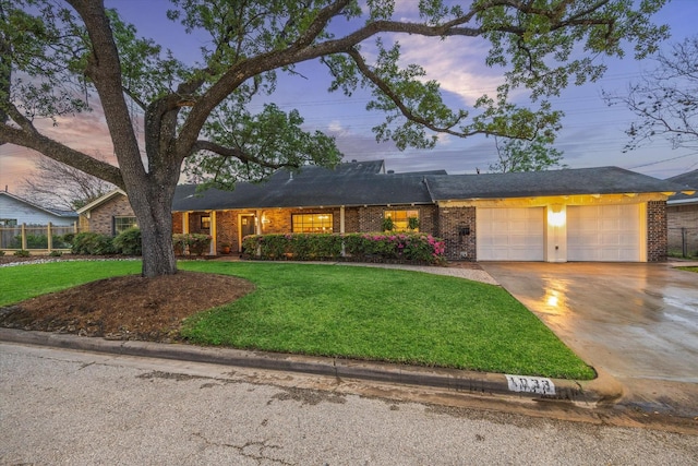 1033 Gardendale Dr, Houston, TX 77018 - ranch-style home with a garage, a front yard, and brick siding