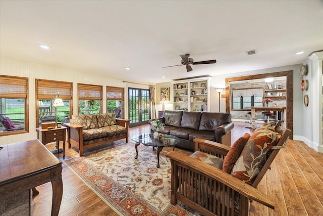1033 Gardendale Dr, Houston, TX 77018 - living area with ceiling fan, recessed lighting, wood finished floors, and visible vents