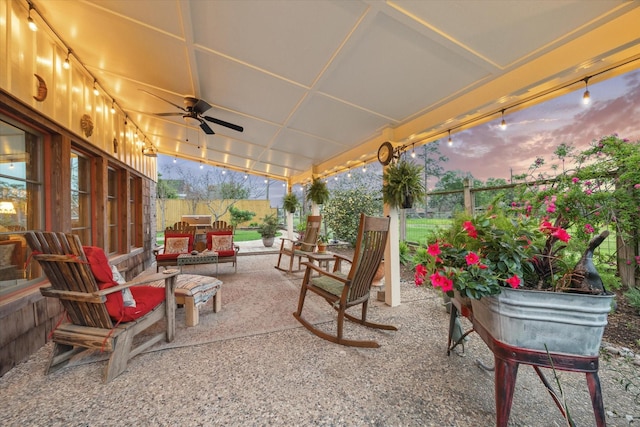 1033 Gardendale Dr, Houston, TX 77018 - patio terrace at dusk with fence and a ceiling fan