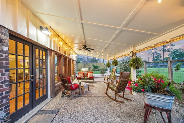 1033 Gardendale Dr, Houston, TX 77018 - view of patio featuring ceiling fan, fence, and french doors
